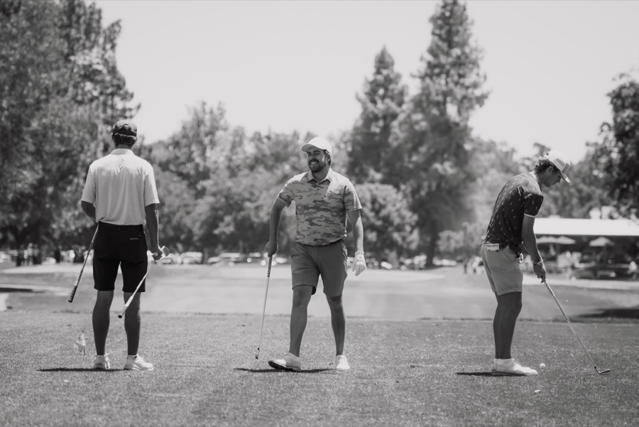 Black and white photo of a group of golfers