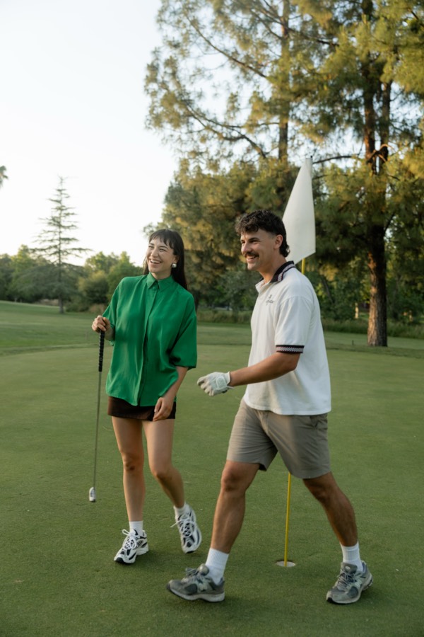 Golfers laughing together on the course